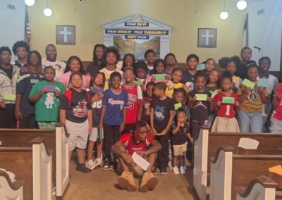 GEBC Youth sitting at the front of the church
